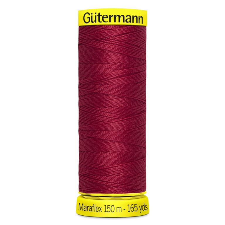 Spool of Gütermann Maraflex sewing thread in dark red color, 150 meters (165 yards) long, with yellow labels on top and bottom.