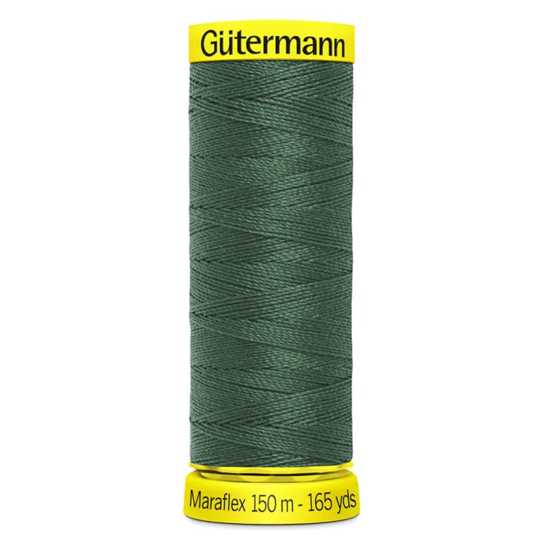 A spool of Gütermann thread. The thread is dark green and wrapped neatly around the spool. The label on the top reads "Gütermann" in black, and the bottom label states "Maraflex 150 m - 165 yds.