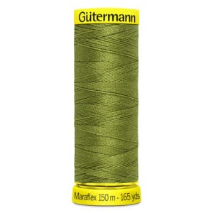 A spool of Gütermann Maraflex thread in olive green. The spool is labeled with "Gütermann" at the top and "Maraflex 150 m - 165 yds" at the bottom, both in black text on yellow backgrounds.