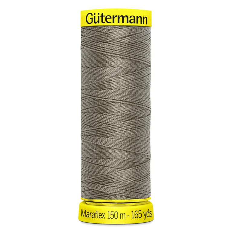 Spool of Gütermann Maraflex thread in gray, wrapped with thread and labeled on both ends. The top label is yellow with black text, and the bottom indicates "Maraflex 150 m - 165 yds" in black text.