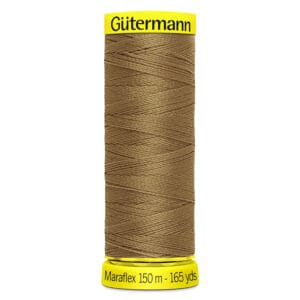 A spool of Gütermann Maraflex thread, 150 meters (165 yards) long, with brown thread. The spool has a bright yellow top and base, with the brand name "Gütermann" and product details printed in black.