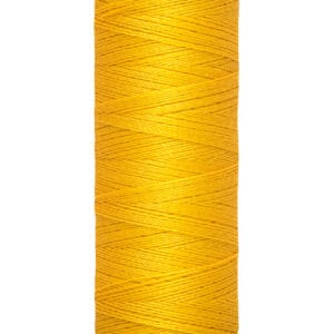 Spool of Gütermann sewing thread in bright yellow color, labeled with "100 m - 110 yds/vgs" on the base.