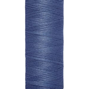 A spool of Gütermann thread in blue, labeled "100 m - 110 yds/vgs.