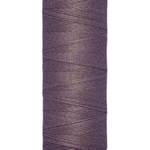 A spool of Gütermann thread in a deep purple color. The spool indicates 100 meters or 110 yards of thread.