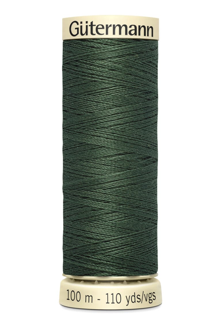 A spool of Gütermann thread with dark green color, labeled "100 m - 110 yds/vgs" at the bottom. The spool has a beige top and bottom, with the brand name "Gütermann" printed on the top section.