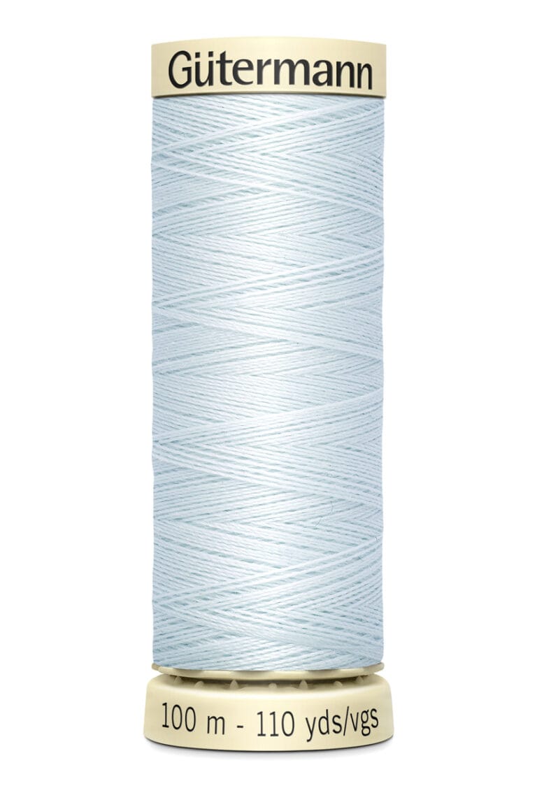 A spool of Gütermann thread in light blue, wrapped uniformly around a beige spool. The label indicates the length as 100 meters or 110 yards.