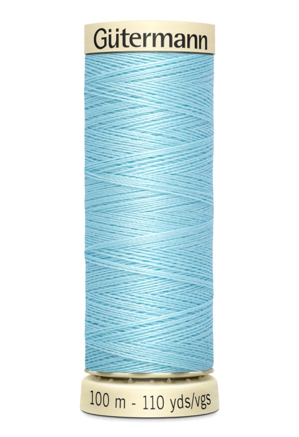 A spool of Gutermann sewing thread, light blue in color, with labels indicating 100 meters and 110 yards.