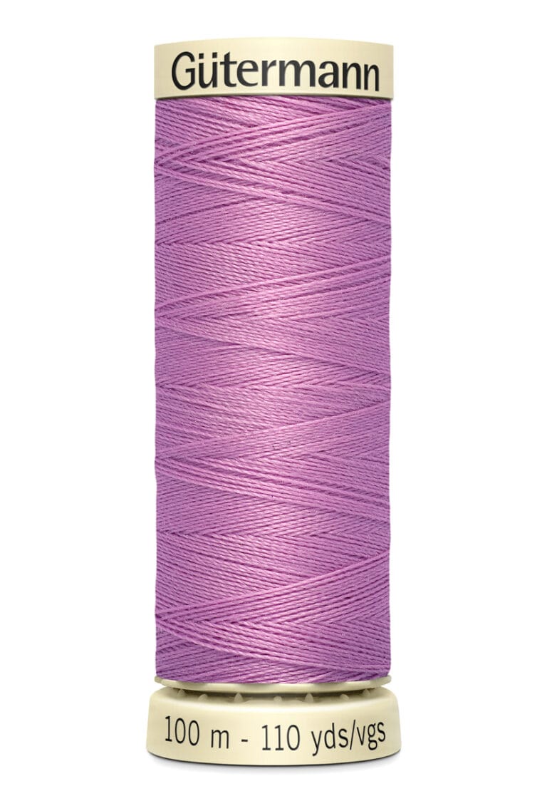 A spool of Gütermann sewing thread in light purple. The label on the spool base reads "100 m - 110 yds/vgs.