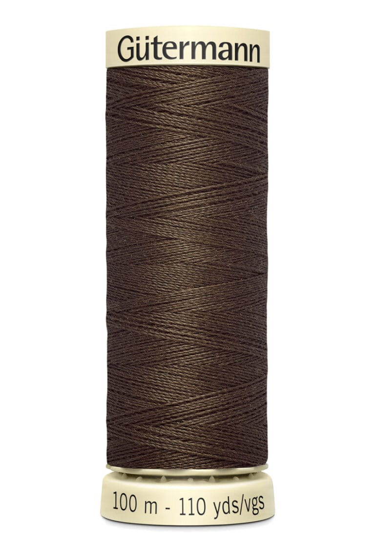 A spool of Gütermann thread in dark brown, labeled for 100 meters or 110 yards. The thread is neatly wound on a cream-colored cylinder with the brand name at the top.