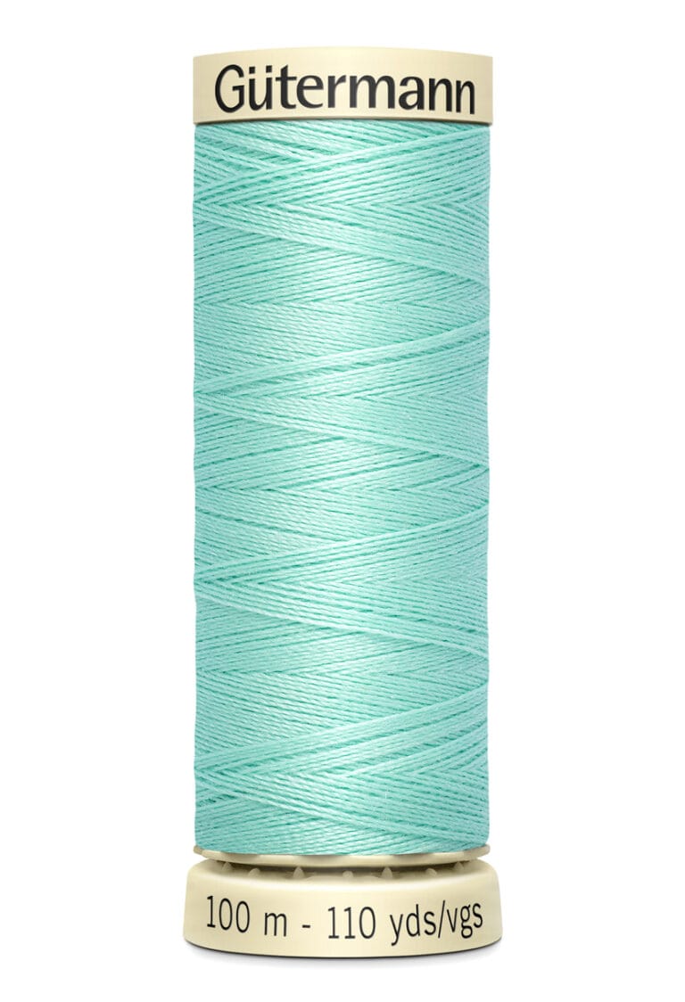 A spool of Gütermann sewing thread in a pastel mint color. The spool is labeled with "100 m - 110 yds/vgs" at the bottom, indicating the length of the thread.