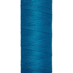 A spool of Gütermann thread in vibrant blue, labeled for 100 meters or 110 yards of thread. The spool is cylindrical, with cream-colored ends displaying the brand name and length information.