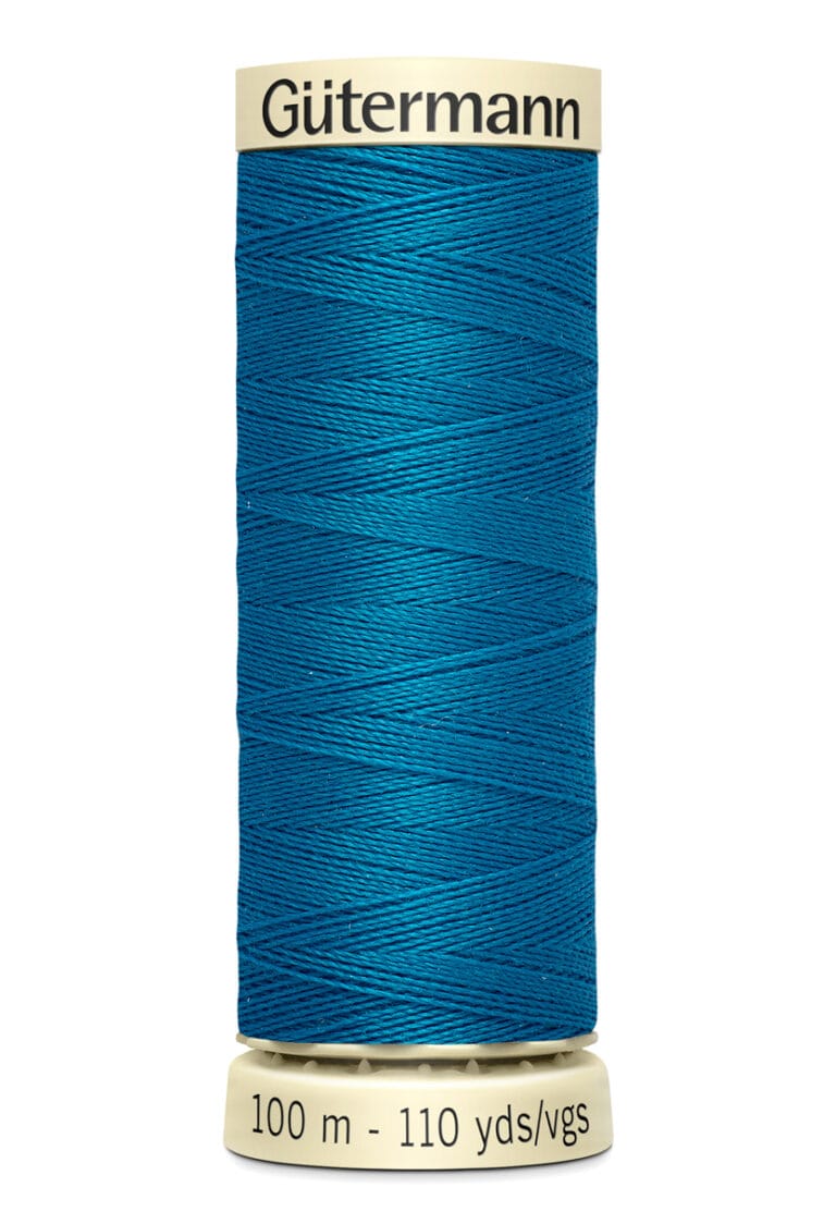 A spool of Gütermann thread in vibrant blue, labeled for 100 meters or 110 yards of thread. The spool is cylindrical, with cream-colored ends displaying the brand name and length information.