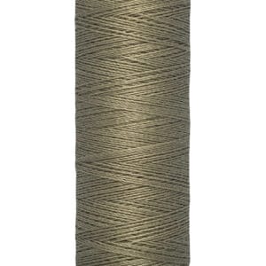 Spool of Gütermann thread in a muted olive color, labeled with "100 m - 110 yds/vgs" at the bottom.