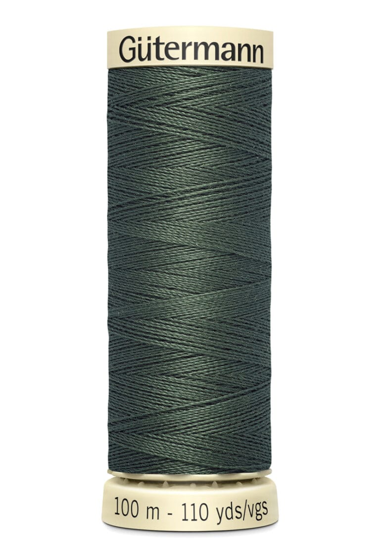 Spool of Gütermann sewing thread, dark green color, with labels showing length 100 meters and 110 yards.