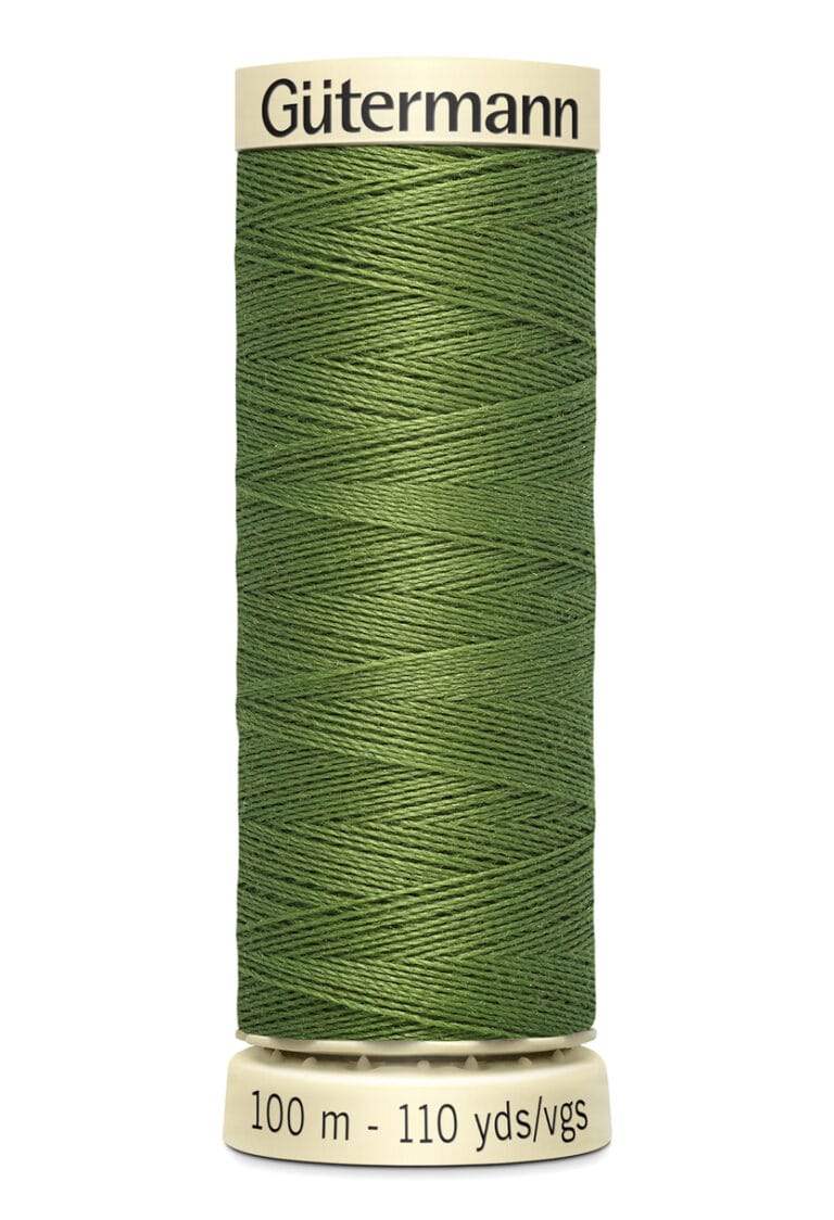 A spool of Gütermann sewing thread in green, labeled with 100 meters and 110 yards. The thread is neatly wound around the spool.