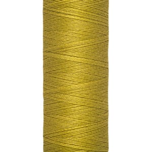 A spool of Gütermann sewing thread in yellow, with a label indicating 100 meters or 110 yards.