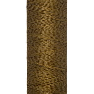 A spool of Gütermann sewing thread, wound with brown thread. The label indicates it's 100 meters and 110 yards in length.