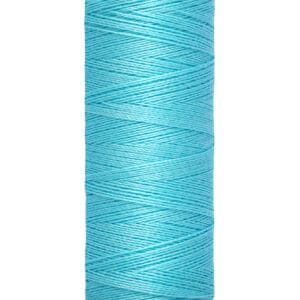 A spool of Gütermann sewing thread in bright turquoise color, labeled with 100 meters and 110 yards. The thread is neatly wound around a white cylindrical spool.