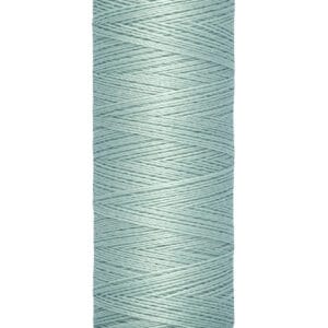 A spool of light blue Gütermann sewing thread, measuring 100 meters or 110 yards, with packaging that has beige ends and black text.