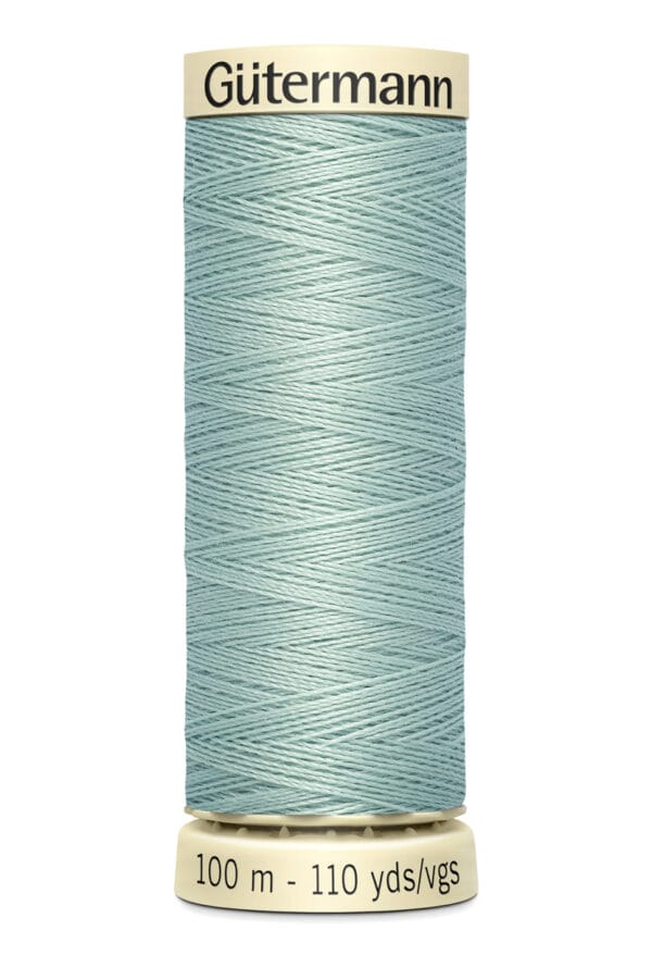 A spool of light blue Gütermann sewing thread, measuring 100 meters or 110 yards, with packaging that has beige ends and black text.