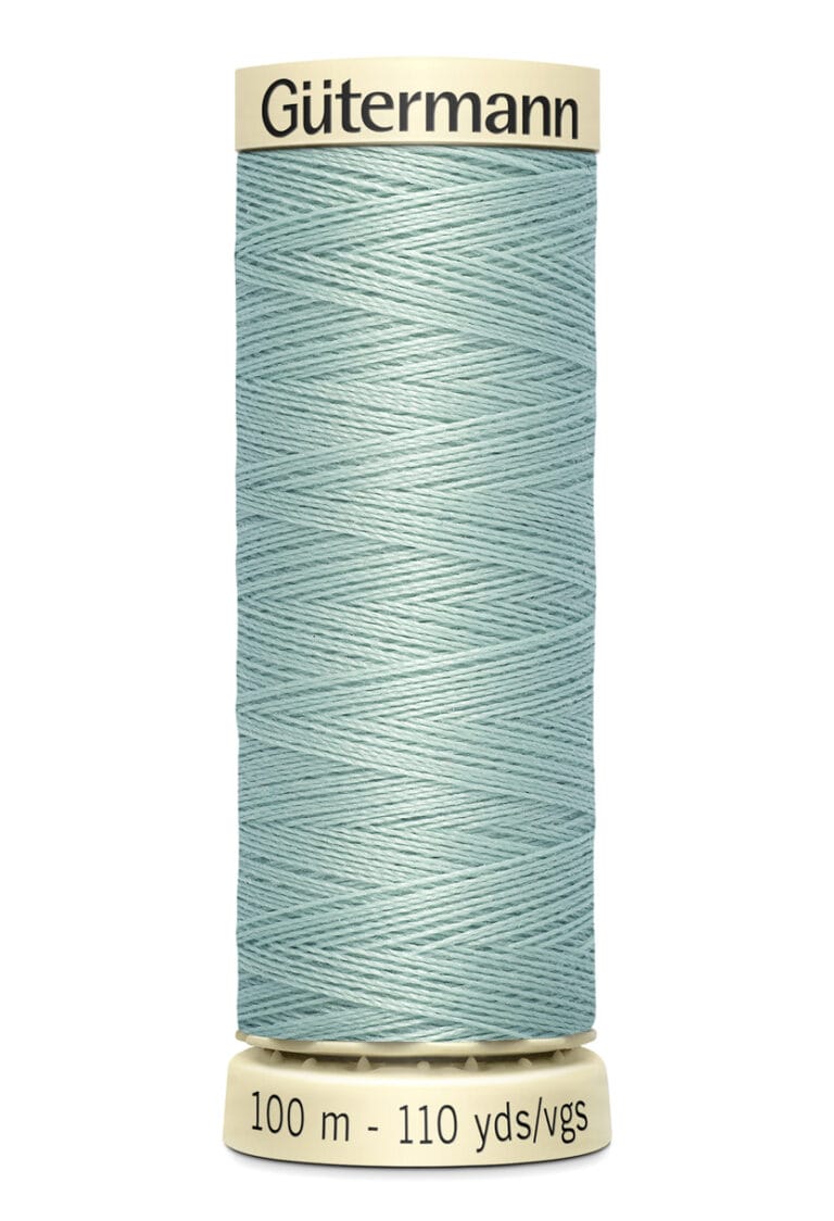 A spool of light blue Gütermann sewing thread, measuring 100 meters or 110 yards, with packaging that has beige ends and black text.