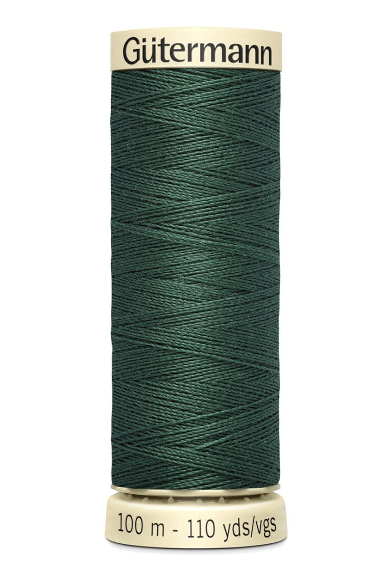 A spool of Gütermann thread in dark green. The spool shows the brand name at the top and indicates it contains 100 meters or 110 yards of thread.