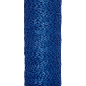Spool of Gütermann blue sewing thread showing 100 meters or 110 yards capacity. The thread is tightly wound around a beige cylindrical spool.