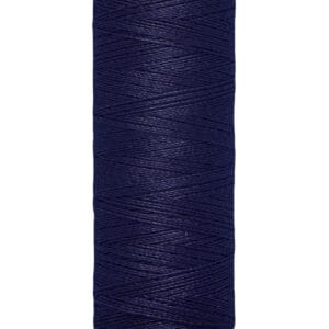 A spool of Gütermann navy blue sewing thread, showing the brand name at the top. The label at the base indicates 100 meters, or 110 yards. The thread is neatly wound around the spool.