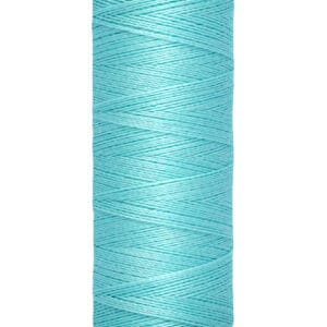 Spool of Gütermann thread in light blue, labeled with "100 m - 110 yds/vgs.