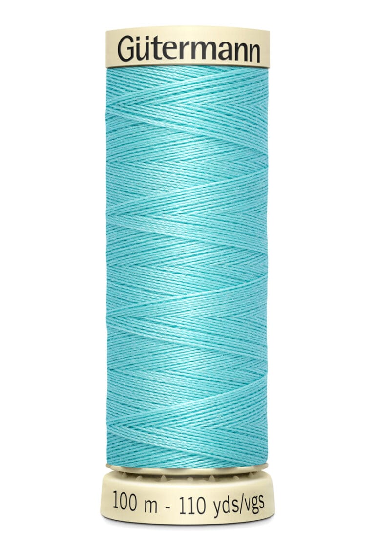 Spool of Gütermann thread in light blue, labeled with "100 m - 110 yds/vgs.