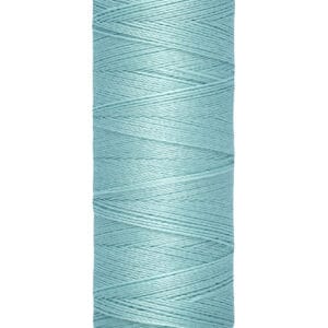 A spool of Gütermann thread in light blue, with a length of 100 meters or 110 yards. The spool has a beige top and bottom, and the brand name is printed on the top.