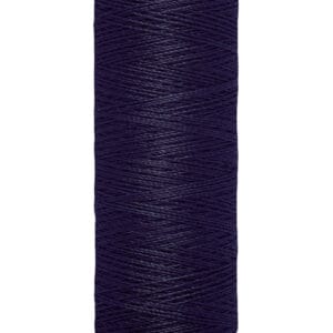Spool of Gütermann sewing thread, deep blue color, labeled with "100 m - 110 yds." The spool is cylindrical with a beige top and bottom.