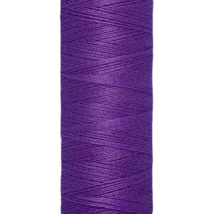 A spool of Gütermann thread with 100 meters (110 yards) of vibrant purple thread. The spool is beige with brand and measurement details printed on it.