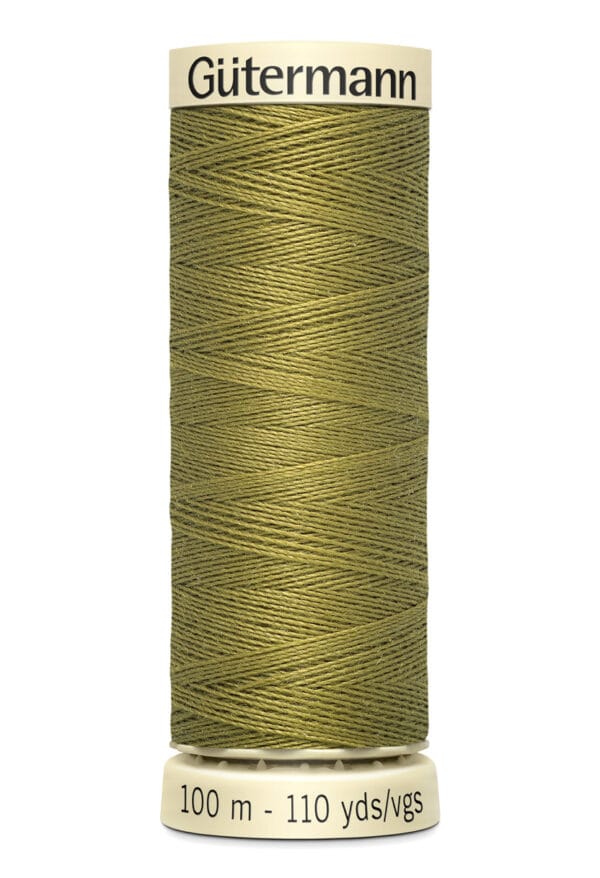 A spool of Gütermann thread in olive green. The label indicates a length of 100 meters or 110 yards. The spool has a cream-colored base and top with the brand name printed.