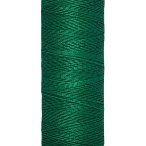 A spool of Gütermann sewing thread with a deep green color, measuring 100 meters (110 yards), is positioned against a white background.