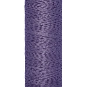 Spool of Gütermann sewing thread, purple in color, labeled with "100 m - 110 yds/vgs" at the bottom, displayed against a white background.