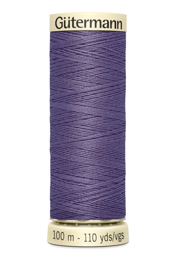 Spool of Gütermann sewing thread, purple in color, labeled with "100 m - 110 yds/vgs" at the bottom, displayed against a white background.