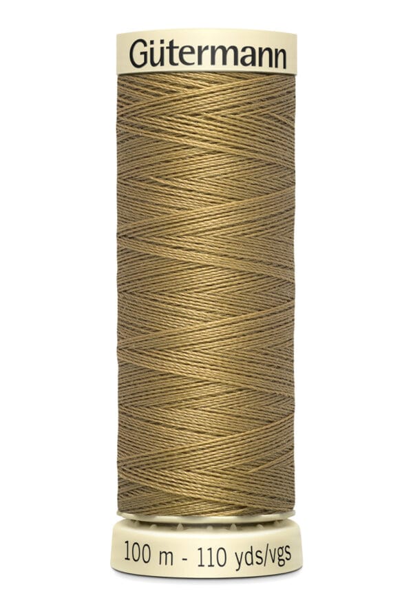 A spool of Gütermann sewing thread in a light brown color. The label reads "Gütermann" at the top and "100 m - 110 yds/vgs" at the bottom, indicating the length of the thread.