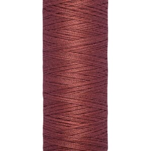 A spool of Gütermann thread in a deep brown color. The spool is neutral in color and shows measurements of 100 meters and 110 yards.