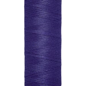 A spool of Gütermann sewing thread in dark blue. The spool is labeled with "100 m - 110 yds/vgs" and has a light beige top and bottom. The thread is wound neatly.