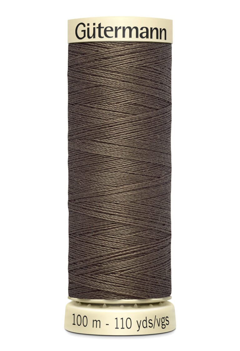 A spool of Gütermann thread, depicted in brown color, holds 100 meters or 110 yards of thread. The spool is cylindrical with a beige top and base displaying the brand and length information.