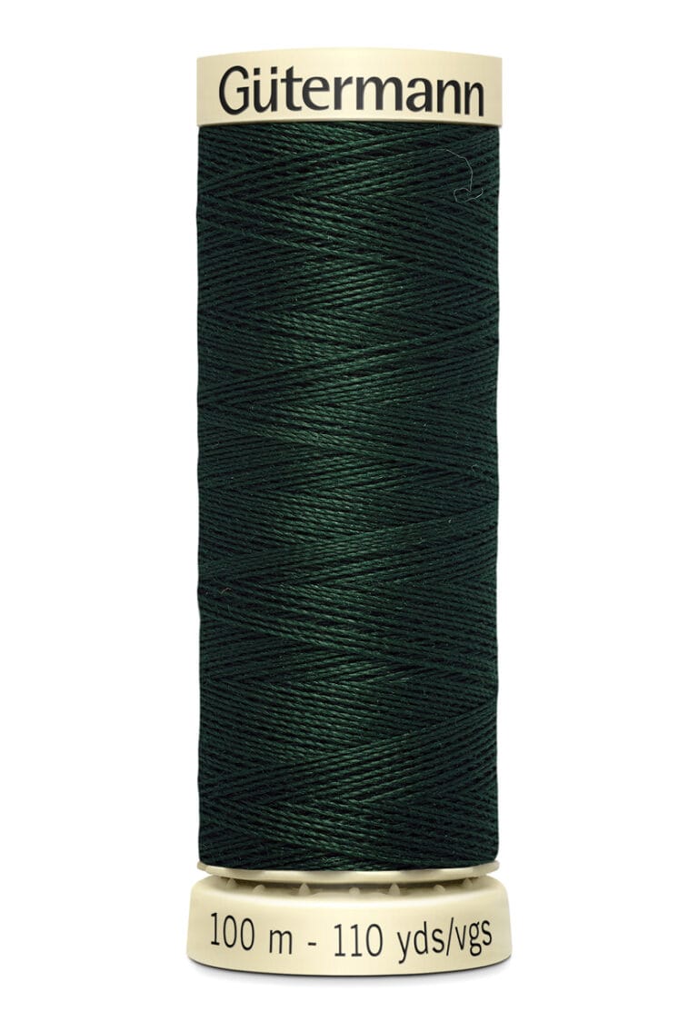 A spool of Gütermann thread, dark green in color, with a label indicating 100 meters (110 yards) in length. The spool has beige-colored ends.