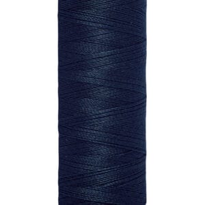 A spool of Gütermann thread, dark blue in color, with 100 meters (110 yards) indicated on the label. The spool has a cream-colored top and bottom, displaying the brand name.