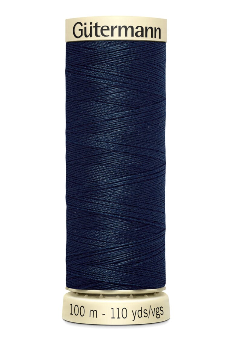 A spool of Gütermann thread, dark blue in color, with 100 meters (110 yards) indicated on the label. The spool has a cream-colored top and bottom, displaying the brand name.