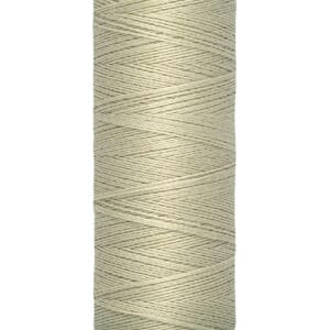 A spool of Gütermann beige sewing thread against a white background. The label shows "100 m - 110 yds/vgs" in black text at the base.