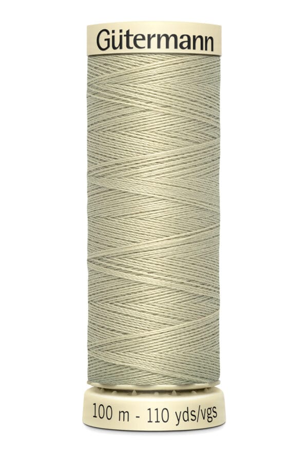 A spool of Gütermann beige sewing thread against a white background. The label shows "100 m - 110 yds/vgs" in black text at the base.