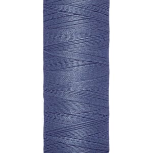 Spool of Gütermann sewing thread, 100 meters (110 yards), in blue. The spool has a cream-colored top and base with branding and length details printed in black.