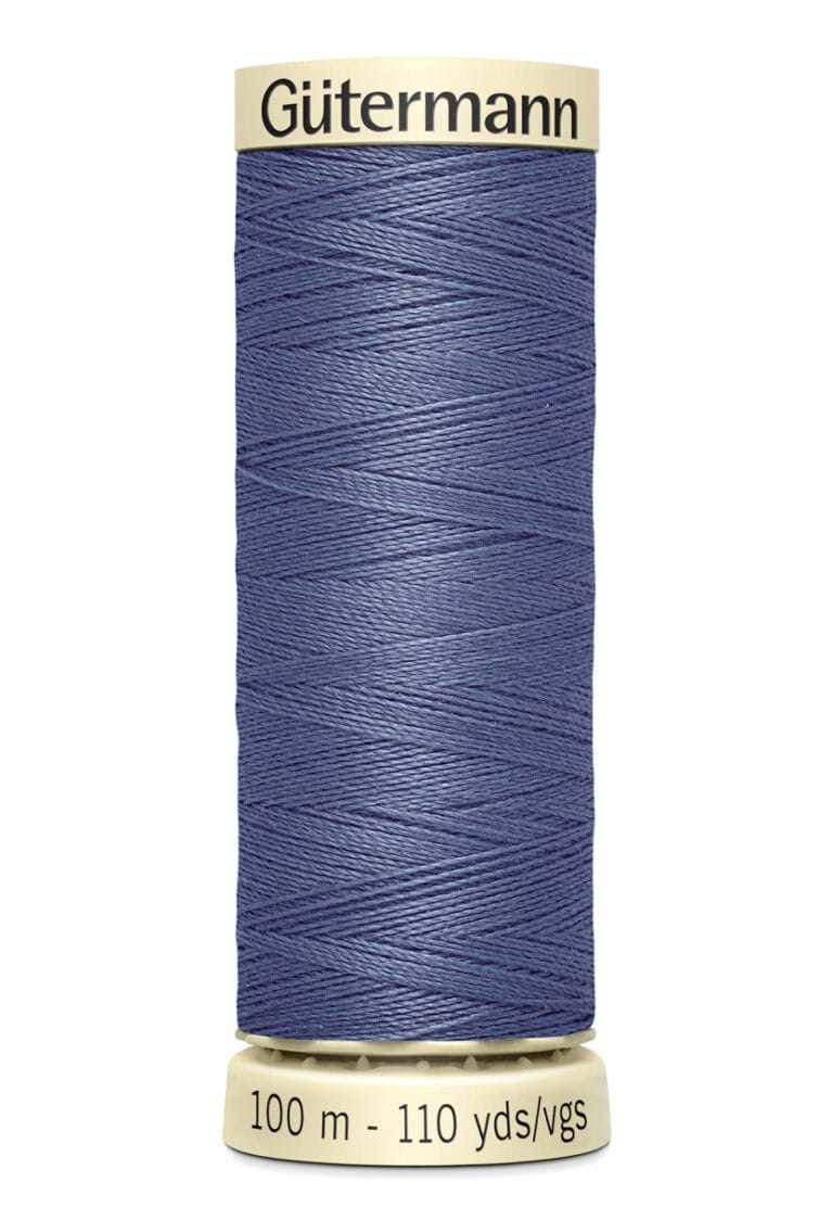 Spool of Gütermann sewing thread, 100 meters (110 yards), in blue. The spool has a cream-colored top and base with branding and length details printed in black.