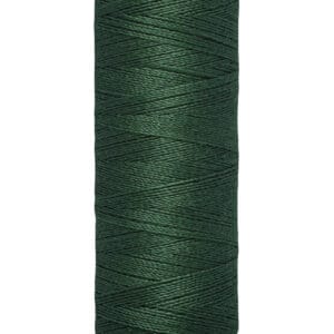 Close-up of a spool of Gütermann sewing thread in dark green. The label on top and bottom of the spool shows "Gütermann" and "100 m - 110 yds/vgs" in black text on a beige background.