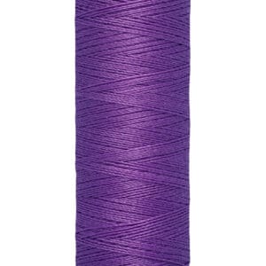 A spool of Gütermann sewing thread in vibrant purple. The cylindrical spool is labeled with "Gütermann" at the top and shows the length as 100 meters or 110 yards at the base.
